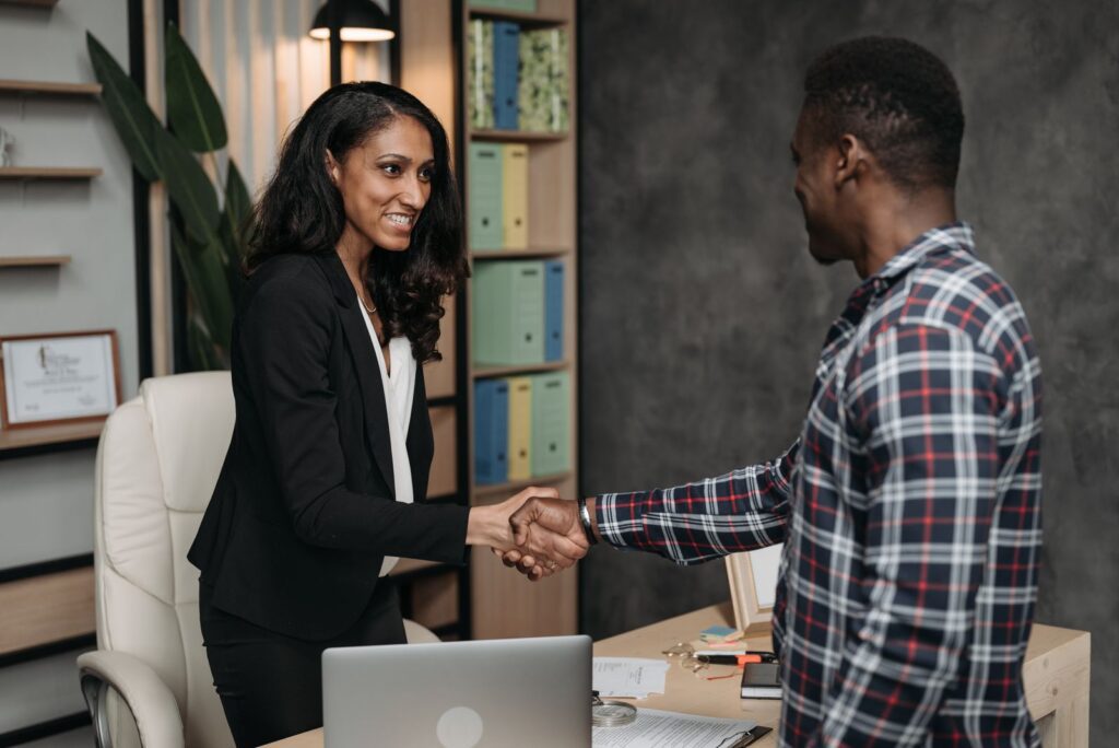 Recruiter and candidate shaking hands